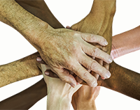 image of multicultural-multi-generational hands clasped together