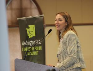 Katy Ruckle speaking at Washington State IT Industry Forum & AI Summit